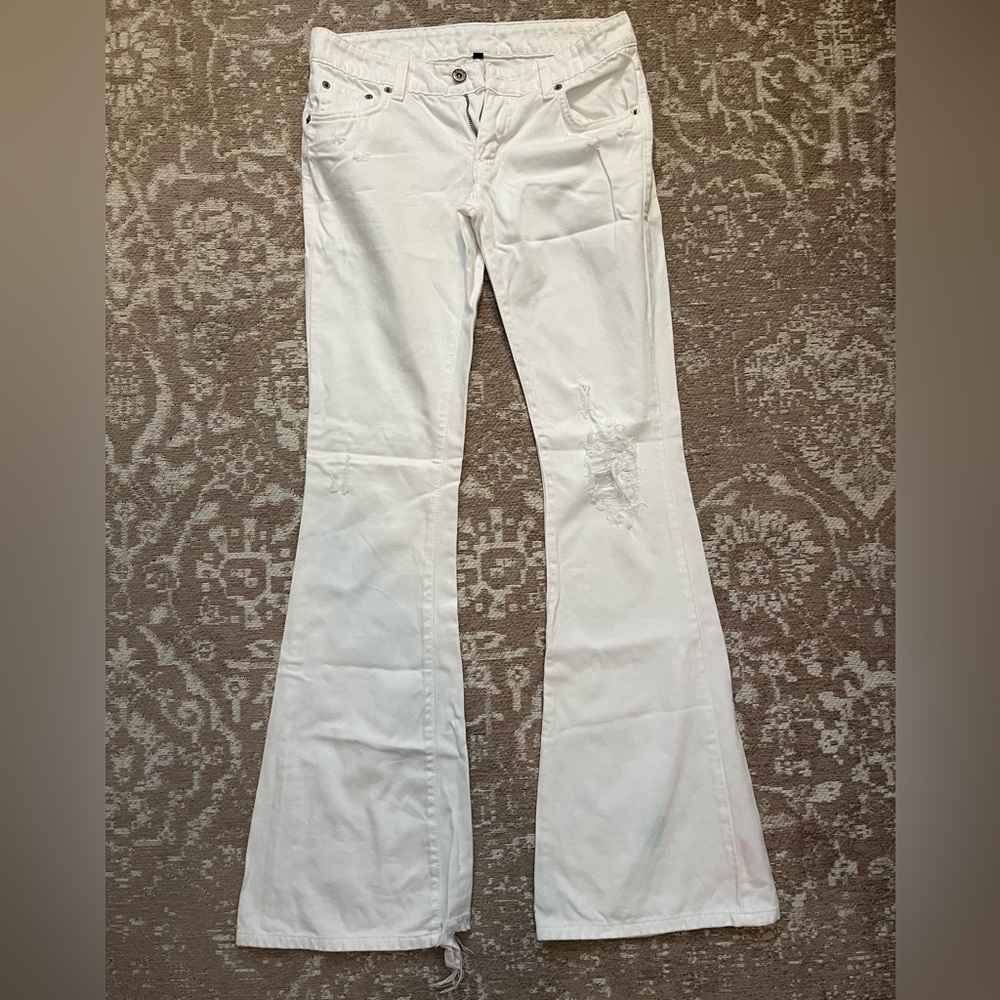 Carmar White flared low rise jeans with destroyed denim details
